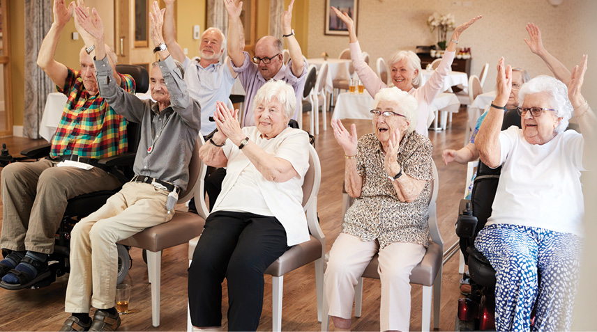 People exercising while sitting in chairs